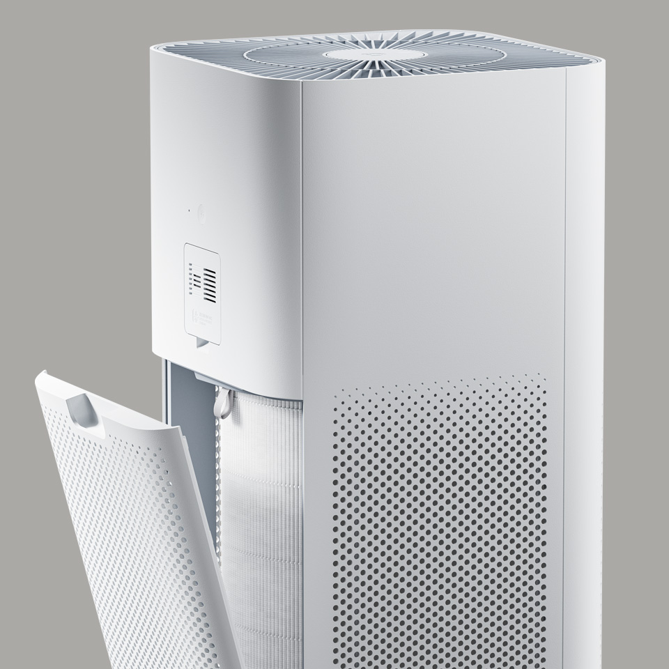 Åben bagside på Xiaomi luftrenseren, der viser den nemme magnetiske adgang til det højeffektive 5-lags filter.